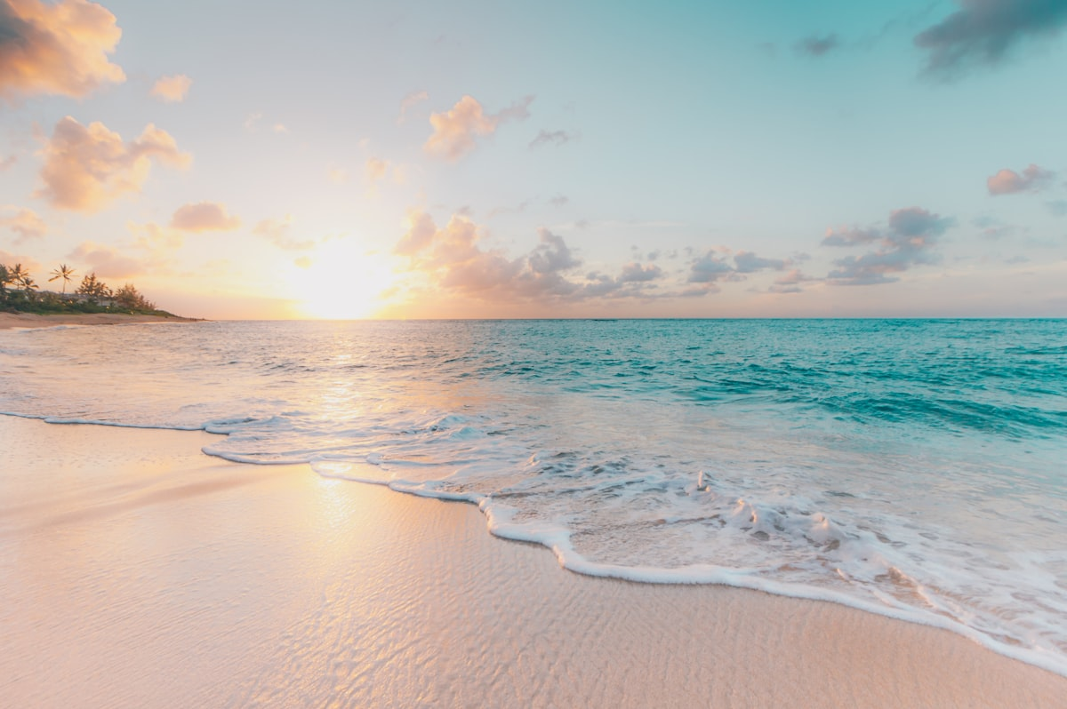 Florida Atlantic coast beach near I-95 highway with clear blue water and white sand